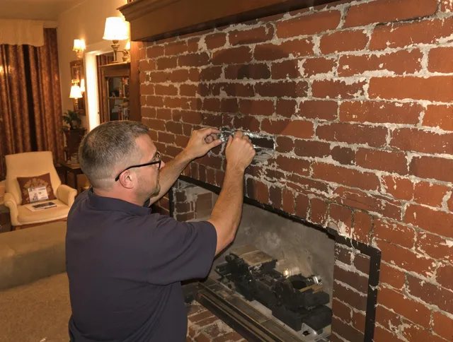 Ontario Chimney Sweep expert fixing a fireplace in Ontario, CA